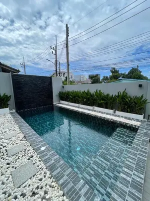 a swimming pool in the backyard of a house at Ozone vista Rawai in Ban Saiyuan (1)