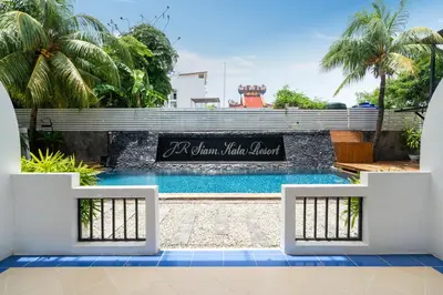 a view of a swimming pool in a resort at JR Siam Inn Resort in Kata Beach