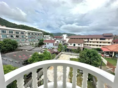 a view of a city from a balcony at Kata Platinum in Kata Beach