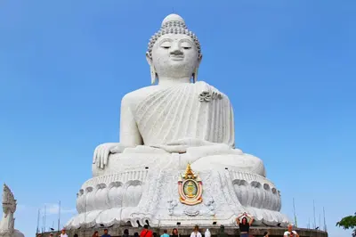 a large statue of avalokitesvara in a park at Phuket Leisure Time Hotel in Rawai Beach