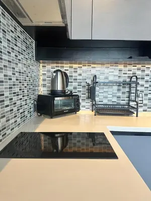 a kitchen with a toaster oven on a counter at Kamala City Gate 1 bedroom By Ere P710 in Kamala Beach