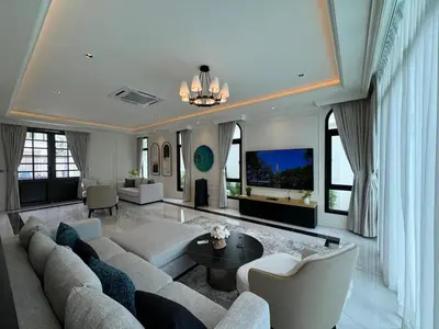 a large living room with a couch and a table at Вилла на Бангтао in Ban Thalat Choeng Thale