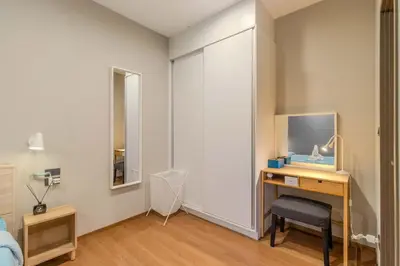 a bedroom with a desk and a mirror at C241 2BR Pool Access 5 Min Walk to Rawai Beach in Rawai Beach