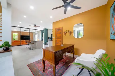 a home office with a desk and a ceiling fan at Exclusive & Private! Elegant Two-Storey Pool Villa Anong in Kamala in Kamala Beach