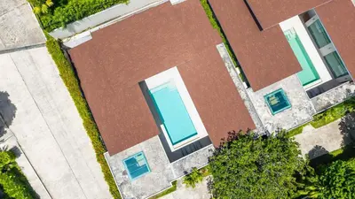 an overhead view of a swimming pool on a house at Elm pool villa Phuket in Kata Beach