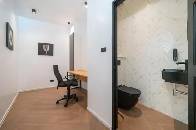 an office with a desk and a chair and a mirror at Villa Heaven in Kata Beach