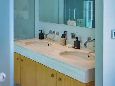 a bathroom with two sinks and a mirror at NEW Cozy 3BR Luxury Pool Villa - Villa Nova in Ban Pak Lak