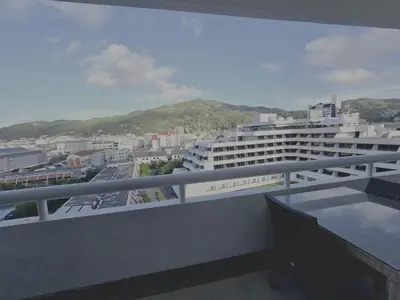 a balcony with a view of a city at WIVA by Woytuk in Patong Beach