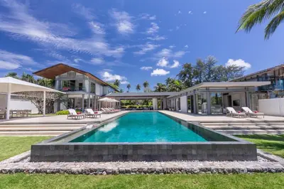 a swimming pool in the backyard of a house at Villa Malee Sai in Ban Han Pa To