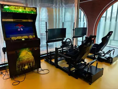 a video game room with two chairs and a video game console at The Legendary Bang Tao 2-bedrooms apart #403 in Laguna Phuket