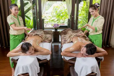 a group of people doing a massage on beds at The Vijitt - Two Bedroom Pool Villa in Ban Saiyuan (1)