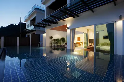 a villa with a swimming pool in a house at Sea View Pool Villa Grand Kamala Falls in Kamala Beach