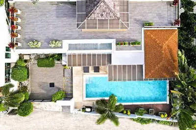 an aerial view of a house with a swimming pool at 2 Bedroom Villa Janine with Private Pool and Rooftop terrace in Kamala Beach
