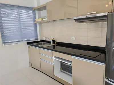 a kitchen with a sink and a counter top at Private Tropical Villa 2bdr Bangtao beach in Laguna Phuket