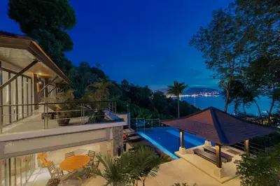 a house with a pool and a view of the ocean at 5 BR Villa Kalim 5 Private Pool with Seaview in Patong Beach