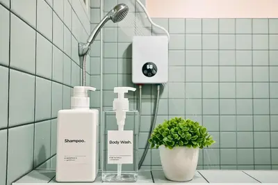 a bathroom with two bottles of soap and a plant at Dalbit Heaven #Patong Beach 3 min walk Super Private House 2BR in Patong Beach