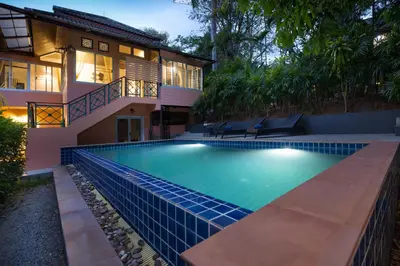 a swimming pool in front of a house at Villa Hillside 2-story-3BR-Private Pool near Big Buddha in Ban Klang