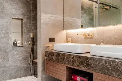 a bathroom with two sinks and a shower at Grand View Lagoon - private paradise in Phuket in Ban Thalat Choeng Thale