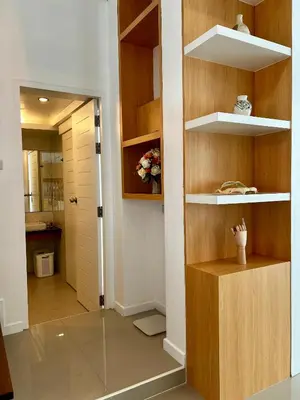 a room with a hallway with wooden shelves and a door at Private 2-Bedroom Pool Villa in Rawai, Phuket in Rawai Beach