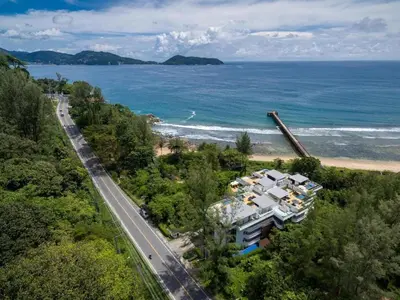 an aerial view of a house next to the ocean at Apartment with sea view 2 beds in Kamala Beach