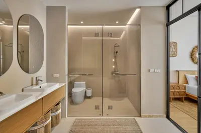 a bathroom with a shower with a toilet and a sink at Villa Moana 2BR Private Pool Naiharn beach in Rawai Beach