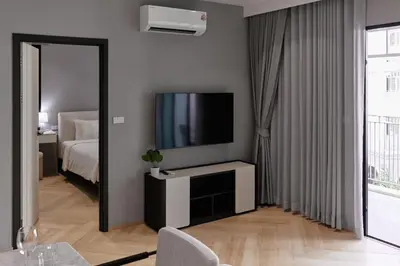 a living room with a television and a bed at Cute apartment 52 m2 in Brand New condo! BangTao in Bang Tao Beach