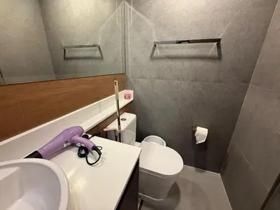 a small bathroom with a sink and a toilet at New Apartment on the 1floor in The Proud Karon in Karon Beach
