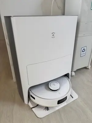a white computer monitor sitting on a shelf at Phuket Moana Pool Villa in Ban Na Nai