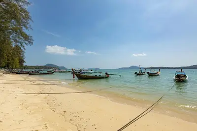 a group of boats in the water on a beach at Tropical villa Sweet Dreams R20, Private Pool, Rawai Beach in Phuket Town