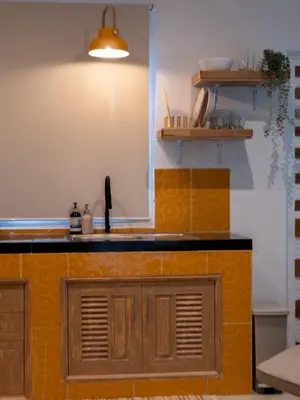 a kitchen with a sink and a counter top at The Fifth Bamboo in Laguna Phuket