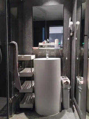 a bathroom with a white tub and a mirror at Tropical bliss & serenity in CityGate Resort near Kamala Beach in Phuket Town