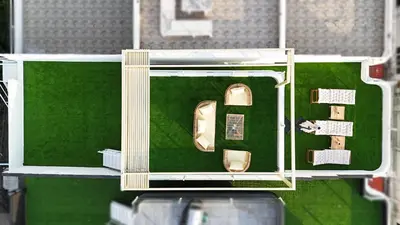 a model of a house with a gold door at Mali Villa 57 in Patong Beach