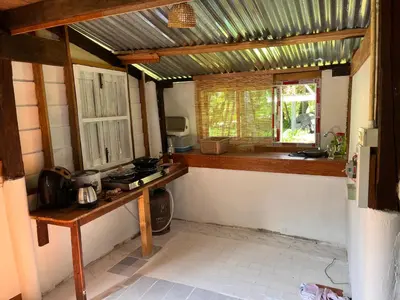 a kitchen with a counter and a window in it at Balance home happy in Ko Yao Noi