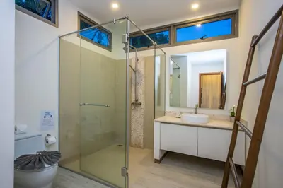 a bathroom with a glass shower and a sink at Private Pool 4BR Villa Kari next to Rawai Beach in Rawai Beach