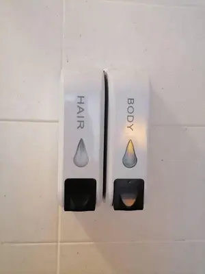 a couple of remote controls hanging on a wall at AtWhitePatong in Patong Beach