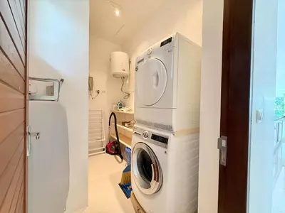 a laundry room with a washer and dryer at Kamala Seaview - 3 BR Private Pool Villa in Kamala Beach