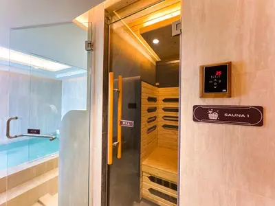 a bathroom with a walk in shower next to a tub at Family Title Legendary 2Bdr Bang Tao in Bang Tao Beach