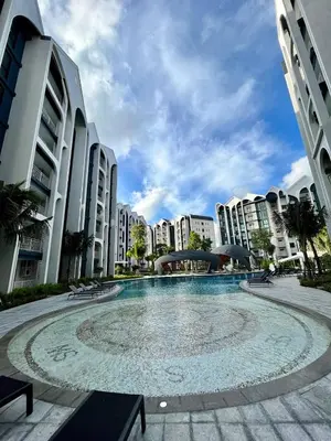 a large pool in the middle of a city with buildings at MO607 1 br 36m in Nai Yang Beach