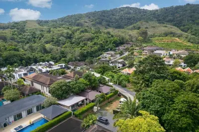 an aerial view of a small town with houses and trees at Oxavia Garden Bungalow B1 -B2 Nai Harn in Rawai Beach