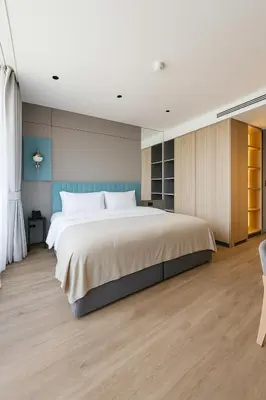 a bedroom with a large bed in a room at Layan Green Park Studio by Search Estate in Phuket