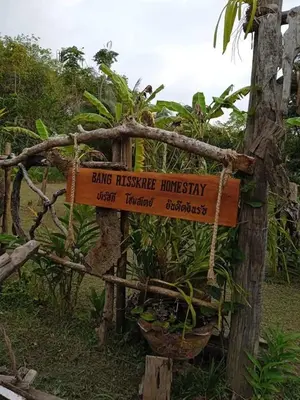 a sign that says king hakusanimpressionhysicalimpysicalysicalysical at Bang risskee home stay2 in Ko Yao Noi