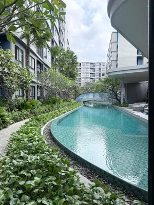 a swimming pool in the middle of a building at DCondo Kathu ใกล้หาดป่าตอง in Kathu