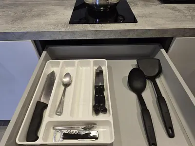 a kitchen counter with utensils in a drawer at Urban Chill -1 Bedroom (T2-216) in Phuket Town