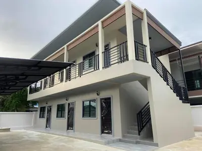 a building with balconies on the side of it at ZAMZAM House in Thalang