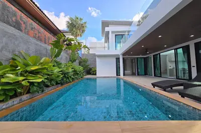 a swimming pool in the backyard of a house at 3BR Pool Villa JAAI in Ban Saiyuan (1)