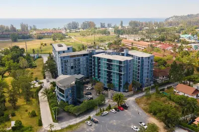 an overhead view of a building with a parking lot at 2 BR Apt Pool View - CTG B507-8 in Kamala Beach