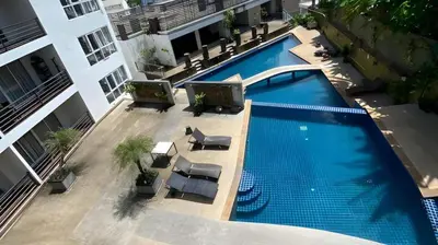 an overhead view of a swimming pool in a building at Smily Phuket Patong Sea View in Patong Beach