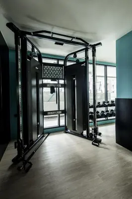a room with a gym with a simulatorhaarhaarhaarhaar at The SPACE Apartment 612 in Ban Thalat Choeng Thale