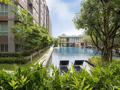 a swimming pool in the middle of a building at Valley Mountain ViewCity Proximity Golden Eight Apartment in Phuket Town