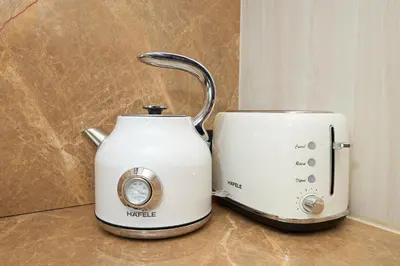 a toaster and a toaster sitting on a counter at Ozone condominium Bang Tao by My Home Phuket in Laguna Phuket